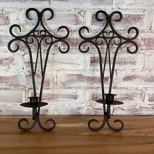 Wrought iron candle stick holders.